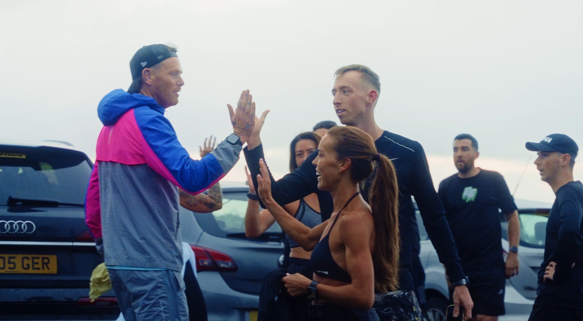 Wolftuna members celebrating together after a run