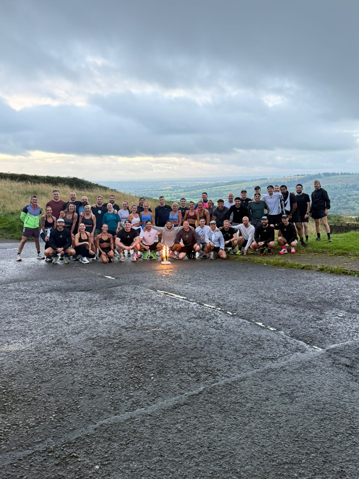 Wolftuna Club members celebrating together on the Campsies