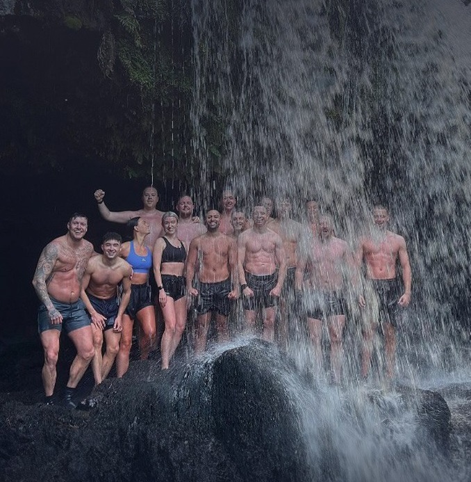 Wolftuna members in a cold water waterfall session