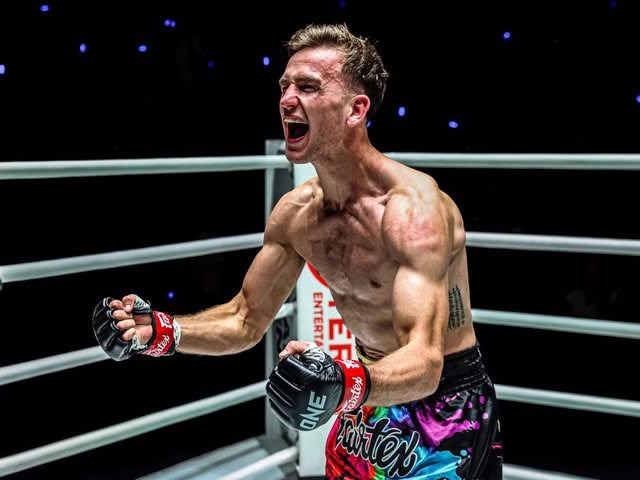 Stevie Irvine celebrating in the ONE Championship ring